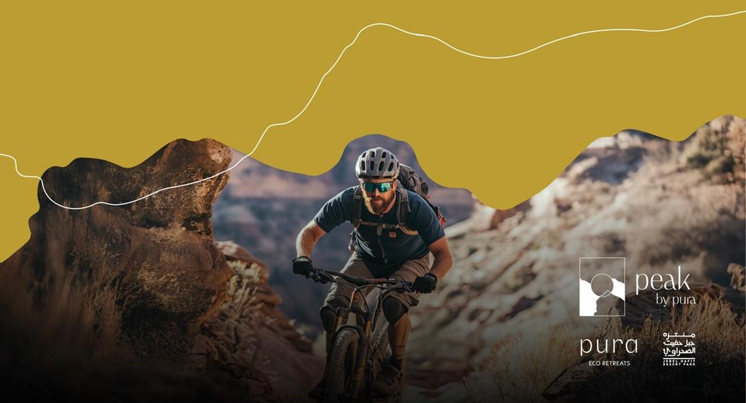 Peak by Pura - MTB Arabia event banner
